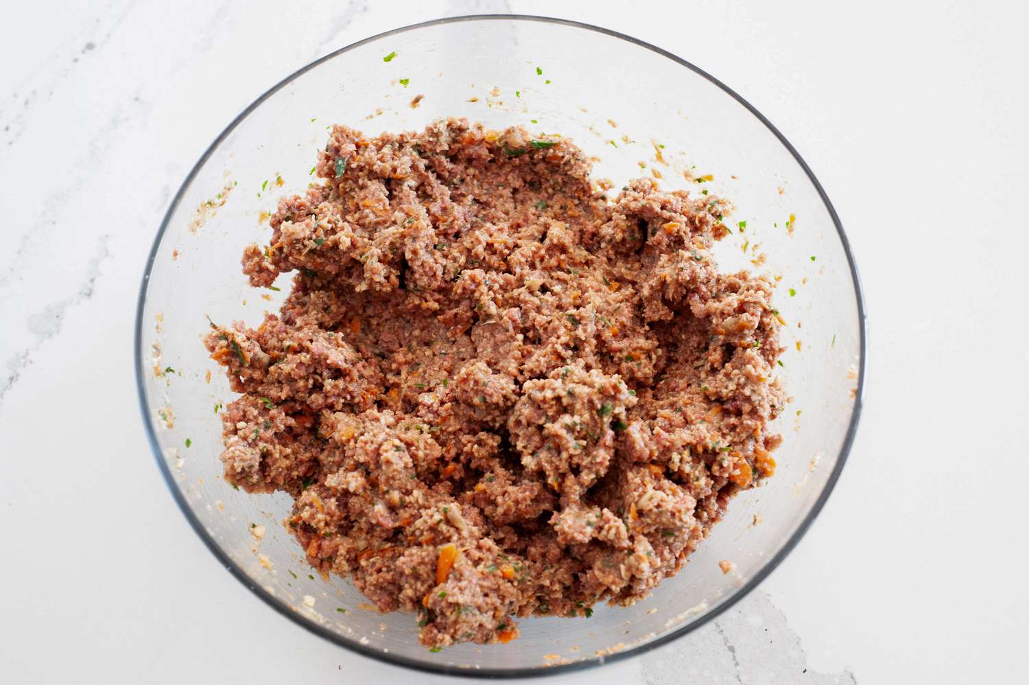 Cooked Vegetables and Beyond Meat Mixed Together in a Bowl 