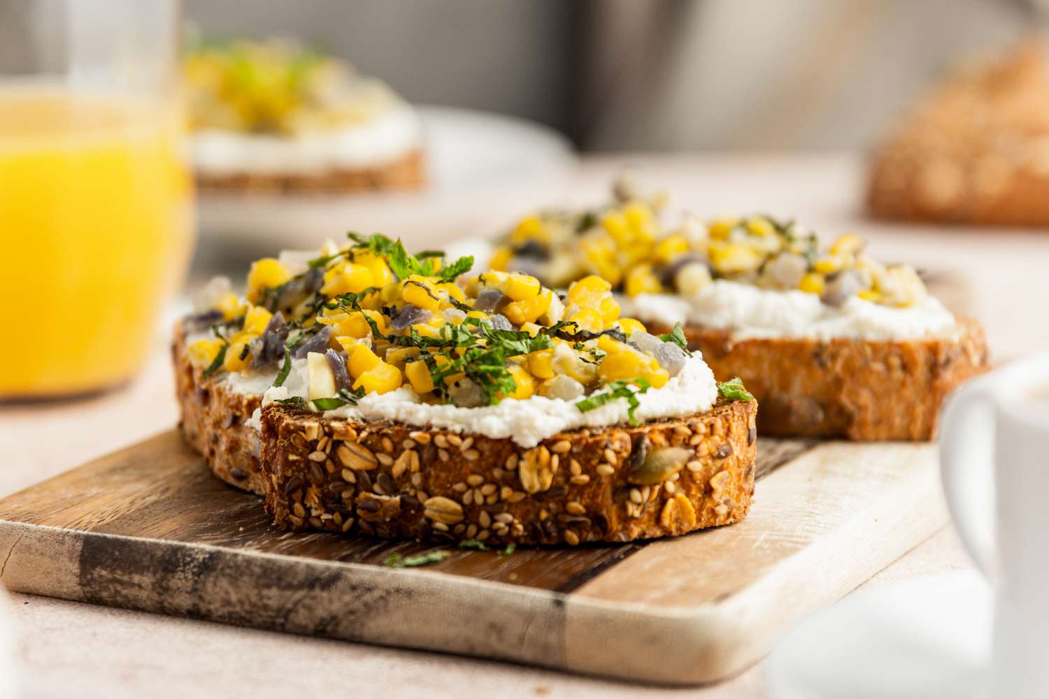 Corn and Ricotta Bruschetta on a Wooden Board