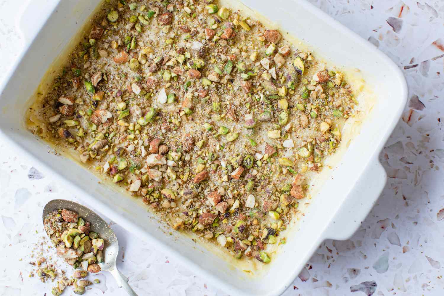 First Layer of Phyllo Dough Covered with Baklava Filling 