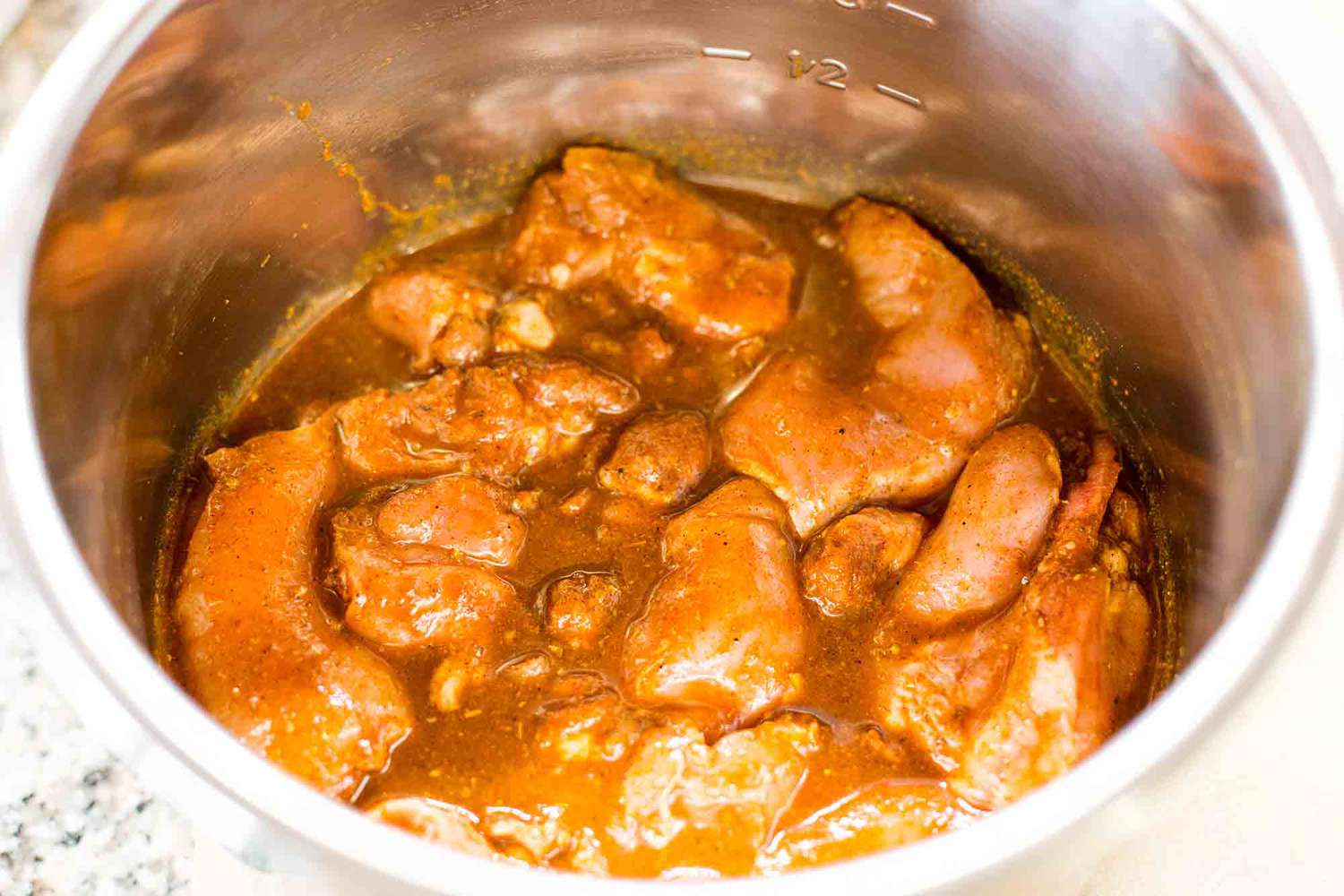 Instant Pot Shredded Chicken add the chicken