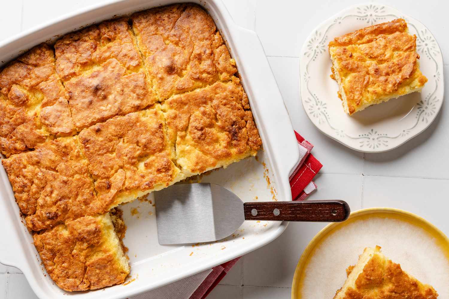 butter swim biscuits (some in the baking pan and some individual slices on a plate 