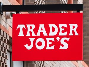 Sign for Trader Joes on a building exterior