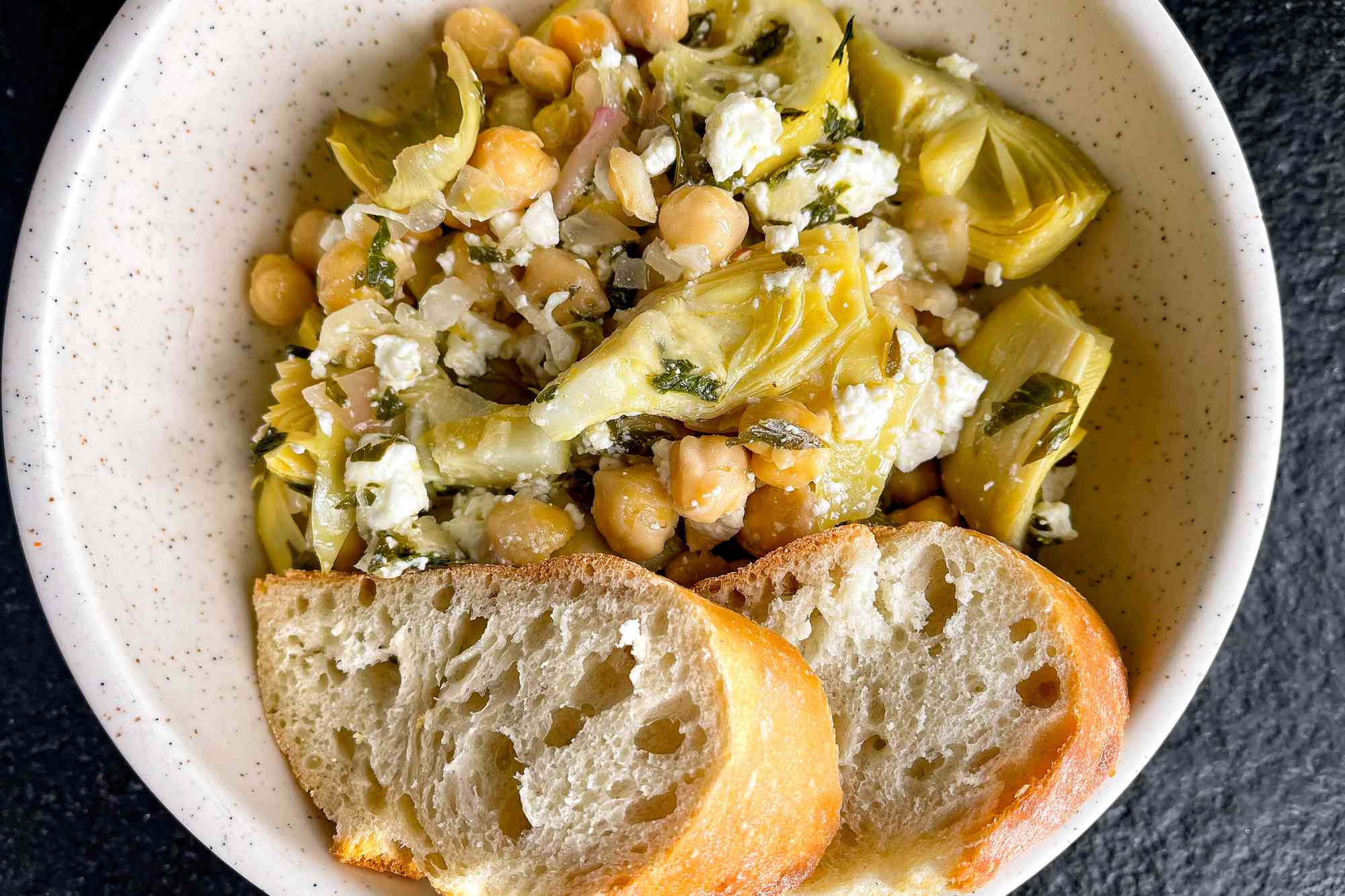 Bowl of roasted artichokes and chickpeas