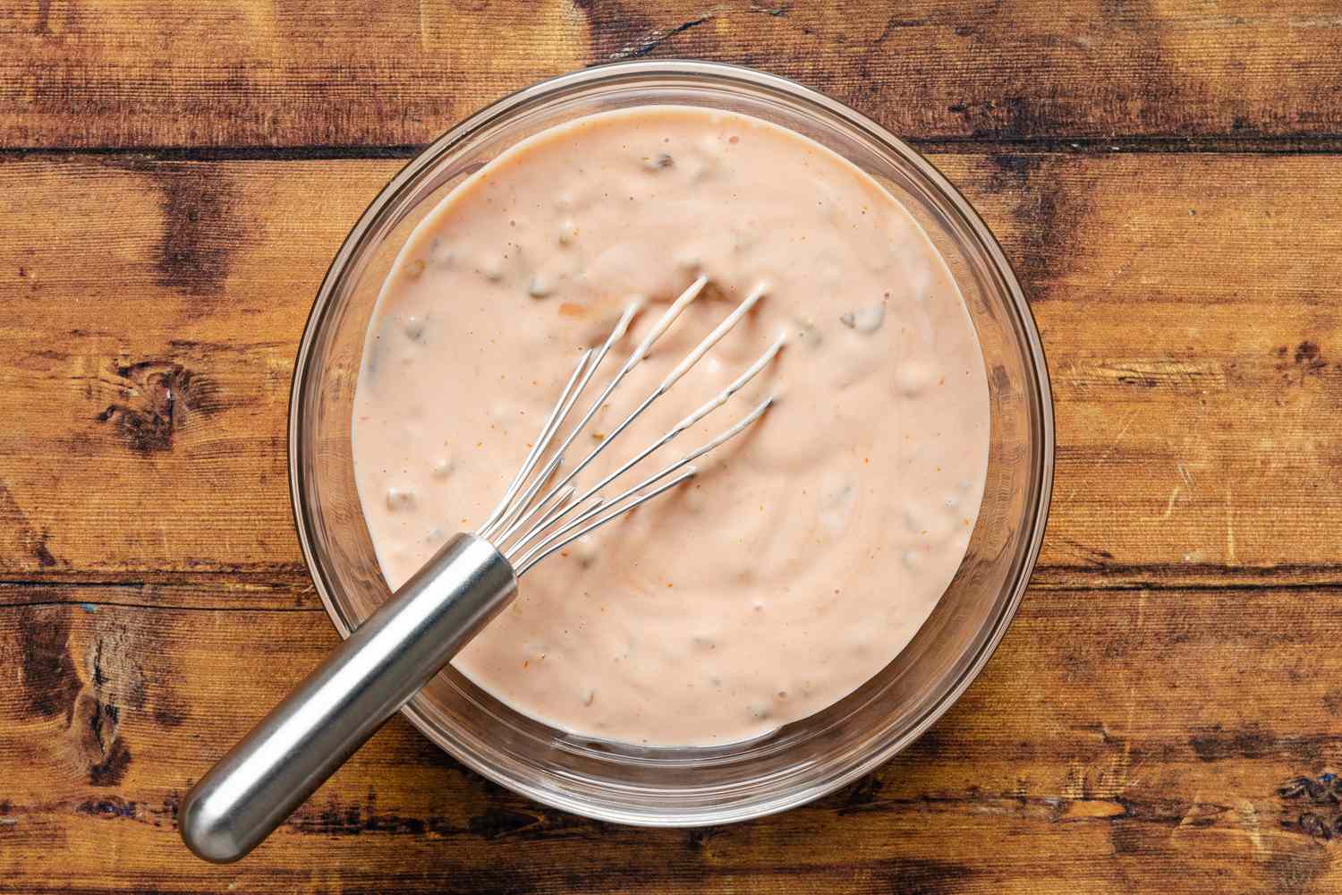bowl of sauce for cheeseburger stuffed baked potatoes recipe