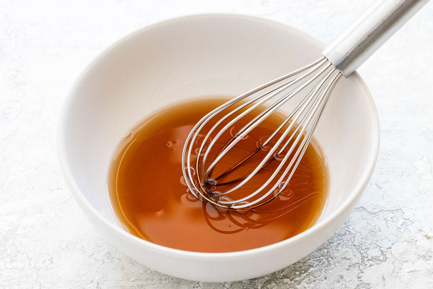 Pickling liquid for smoked salmon, cucumber, and cream cheese crostini.