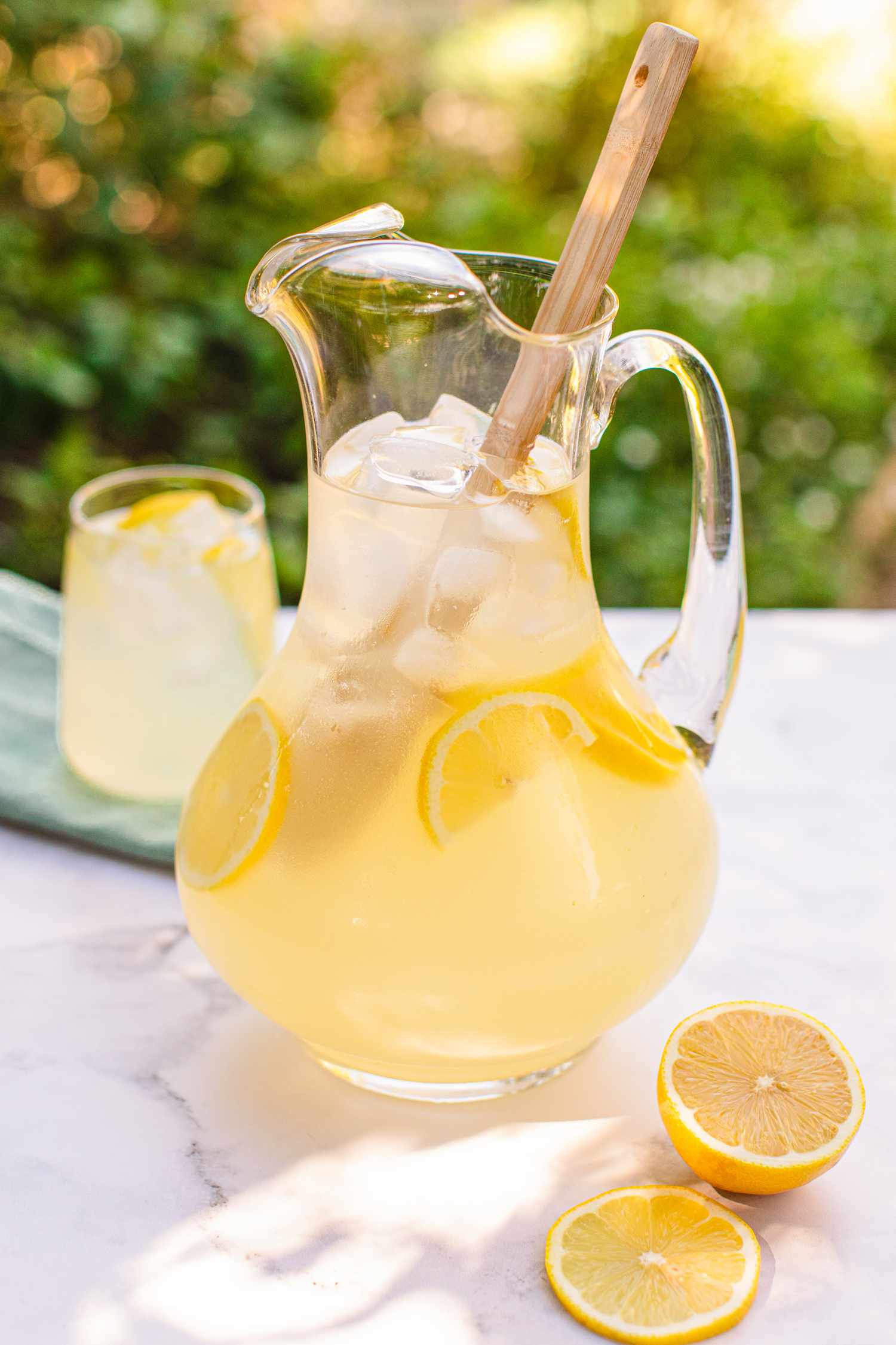 A pitcher of Perfect Lemonade with ice