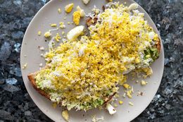 Grated egg on avocado toast