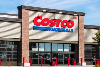 Front entrance of a Costco Wholesale store with prominent signage