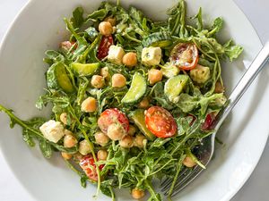 salad dressed with 2-ingredient salad dressing in a bowl