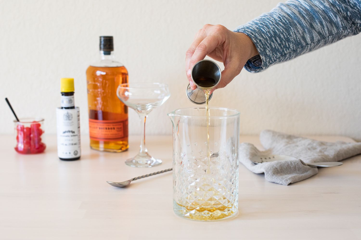 Making a cocktail in a home bar