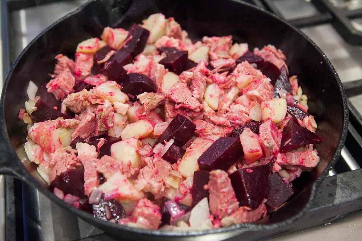 add beets, corned beef, potatoes to the pan with the onions for red flannel corned beef hash browns