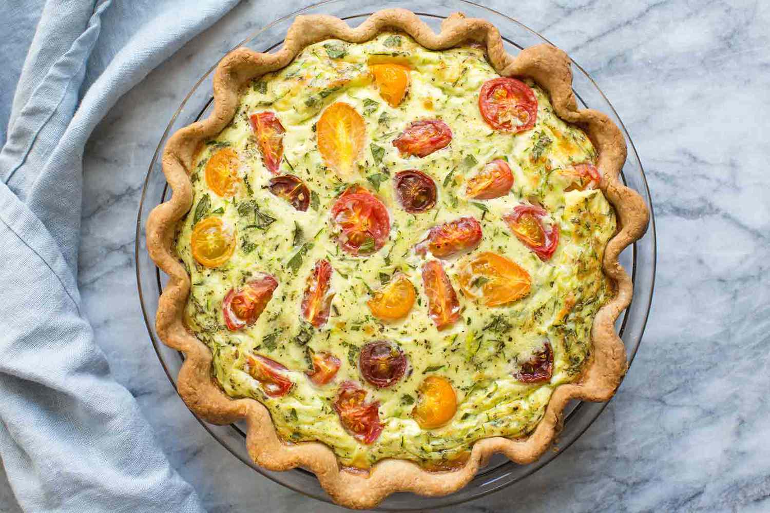 tomato quiche in a pie plate