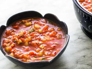 Gazpacho soup in a dark bowl