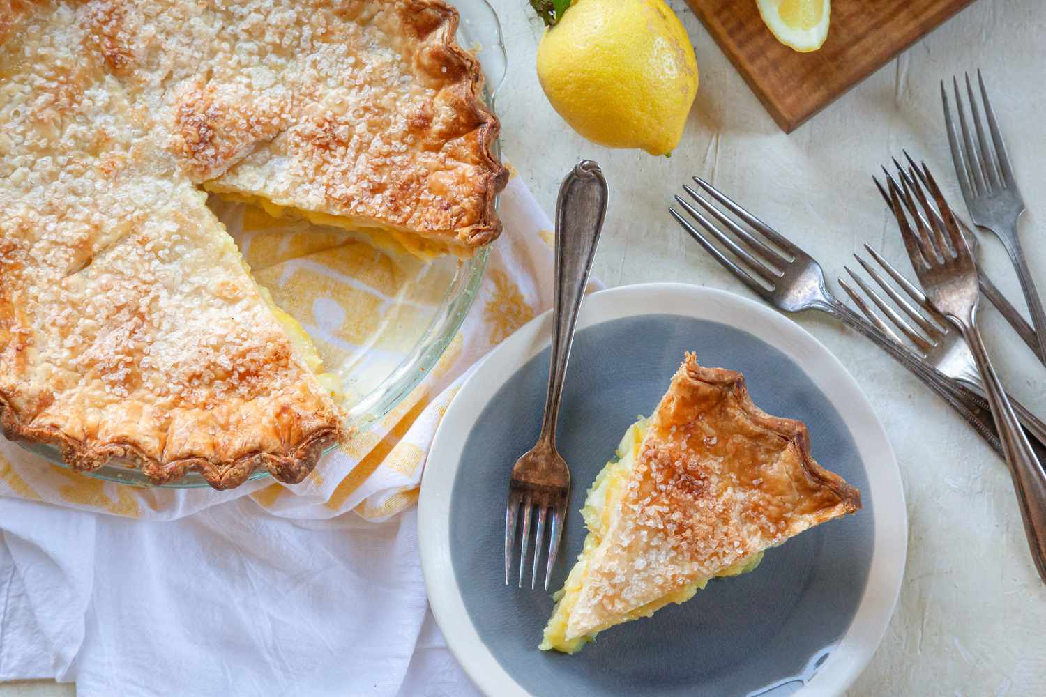 6 Ingredient Lemon Pie with a slice on a plate.