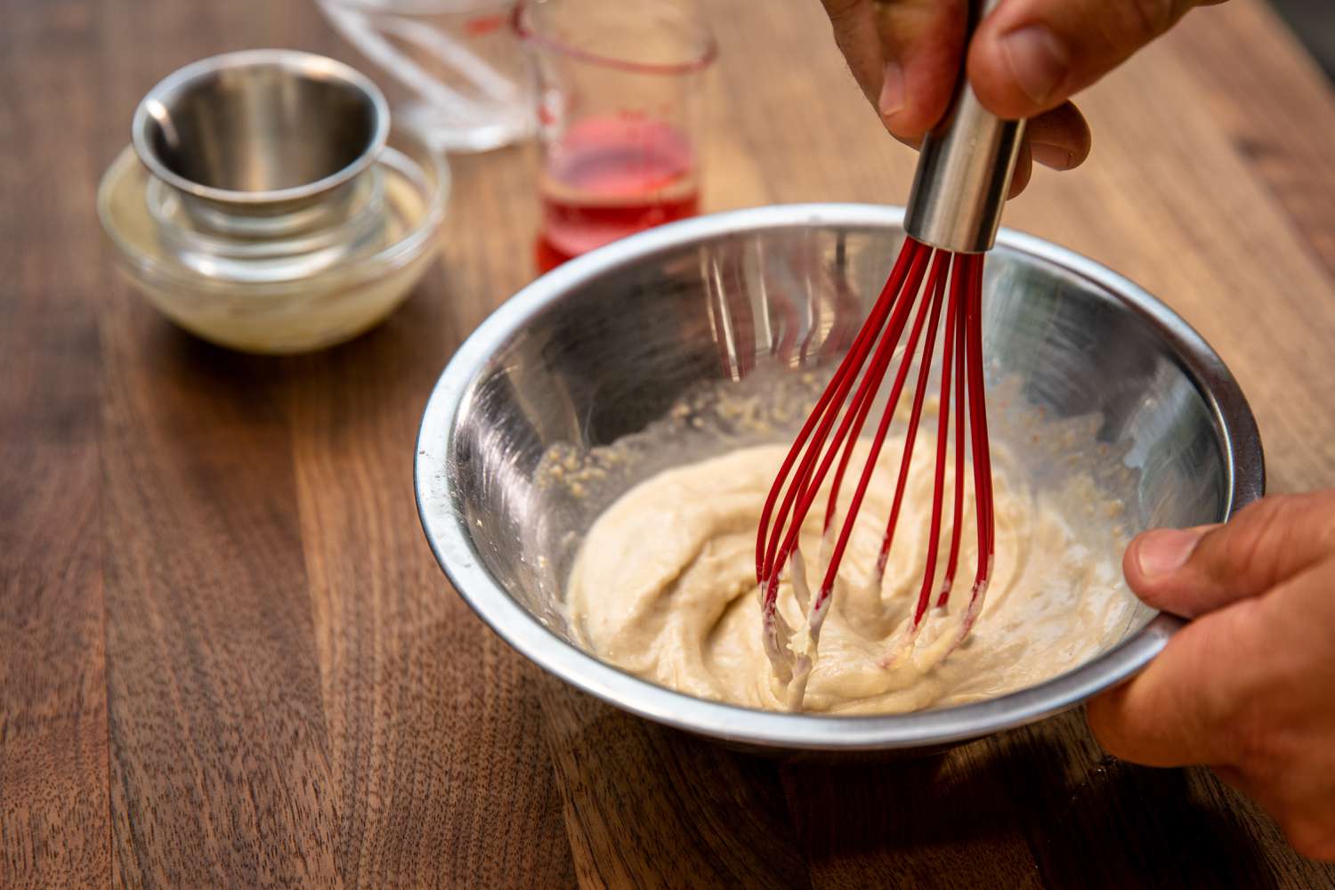 Whisking Sauce in a Bowl for Grilled Okra