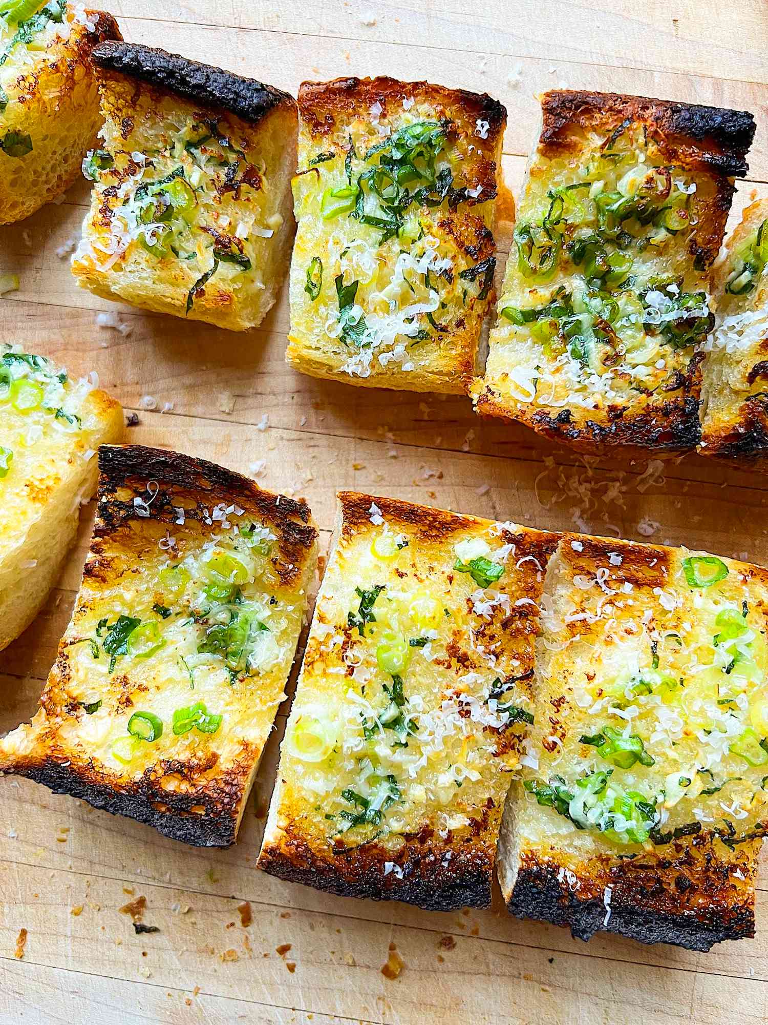 Garlic bread on cutting board