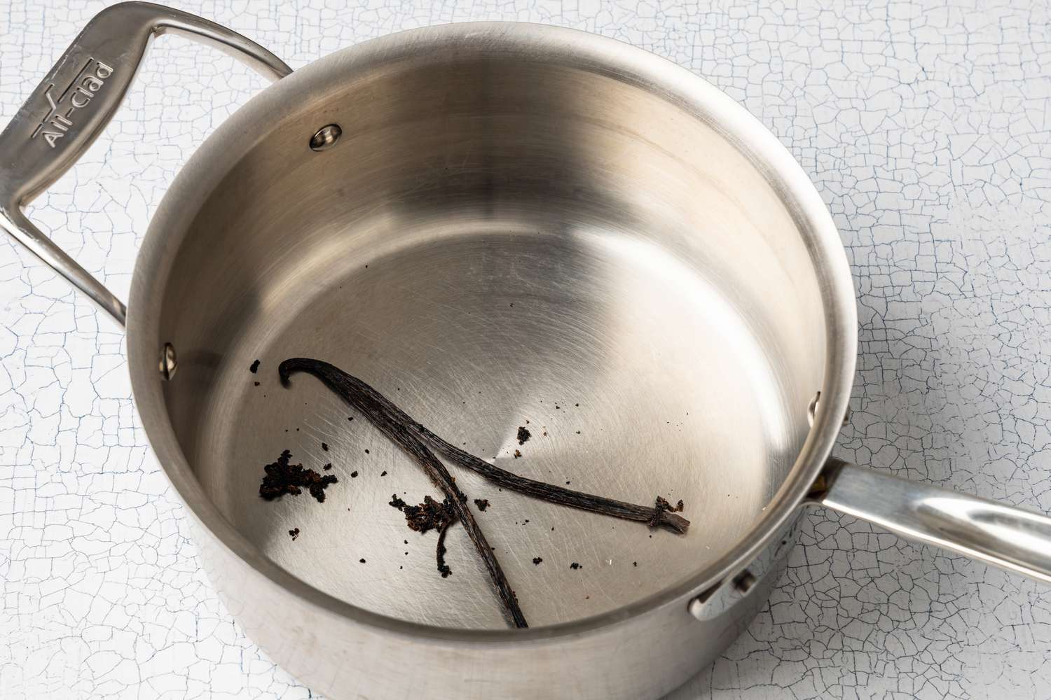 Vanilla Bean Pod and Seeds in a Pot for Homemade Vanilla Pudding