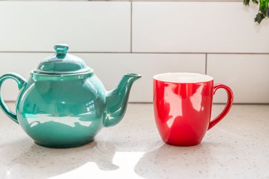 Vibrant cup and tea pot