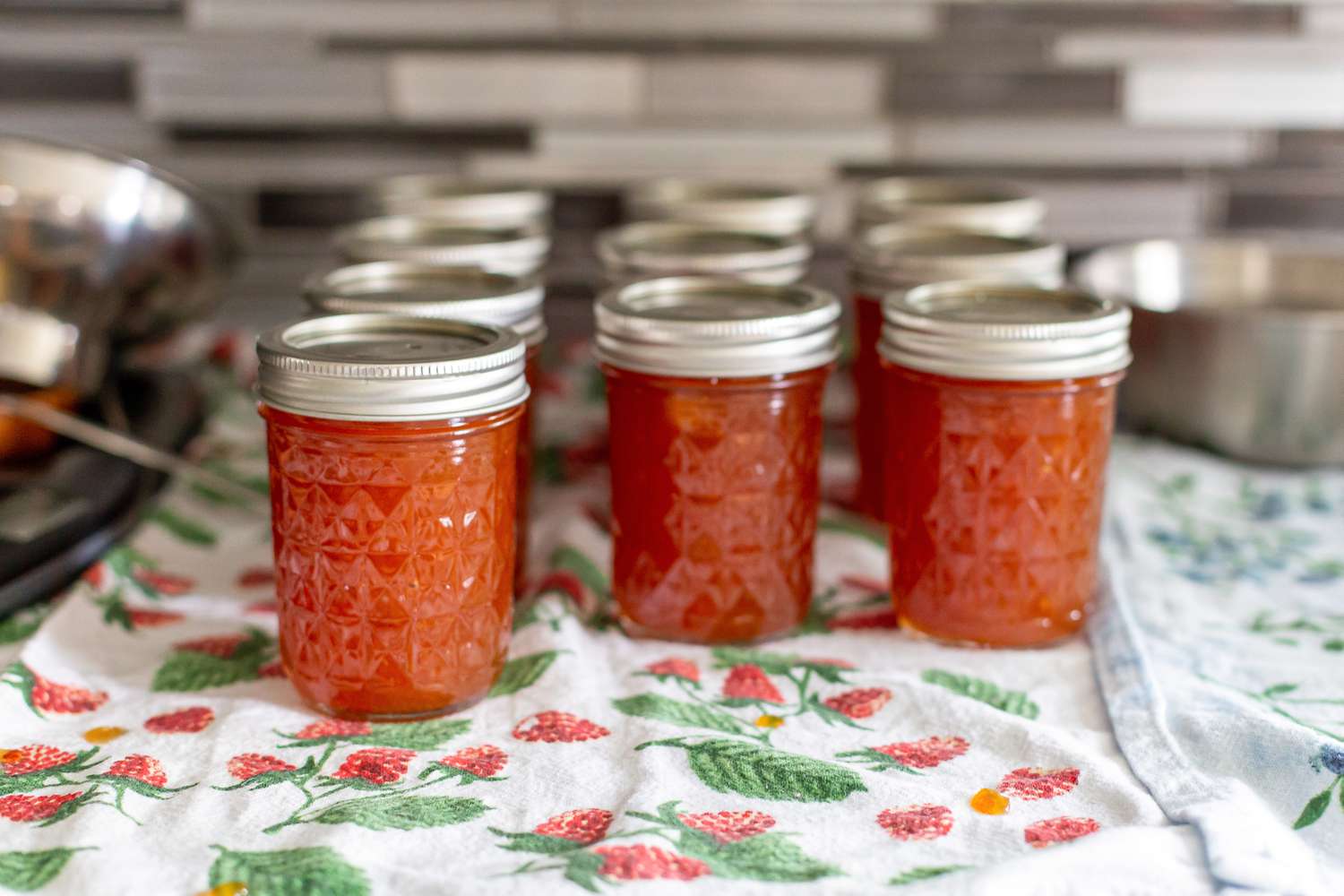 Peach and Pineapple Jam Jars on Counter