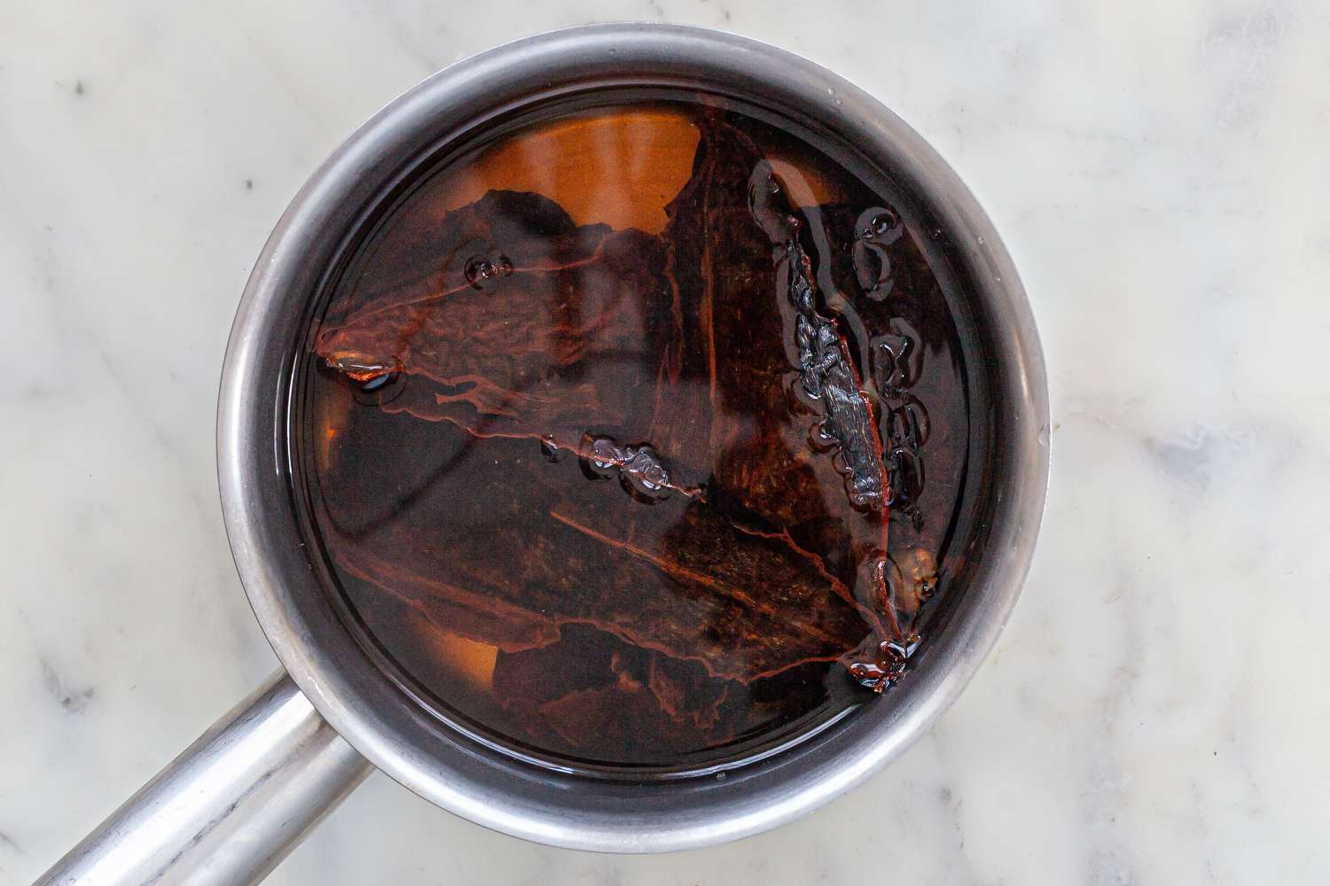 Soaking red chillis.