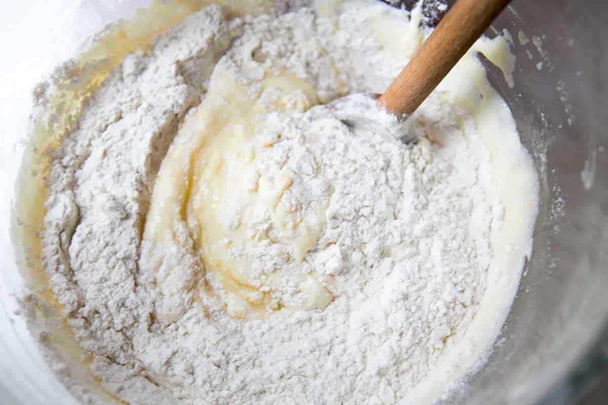 Add the flour to the fruitcake batter and gently mix