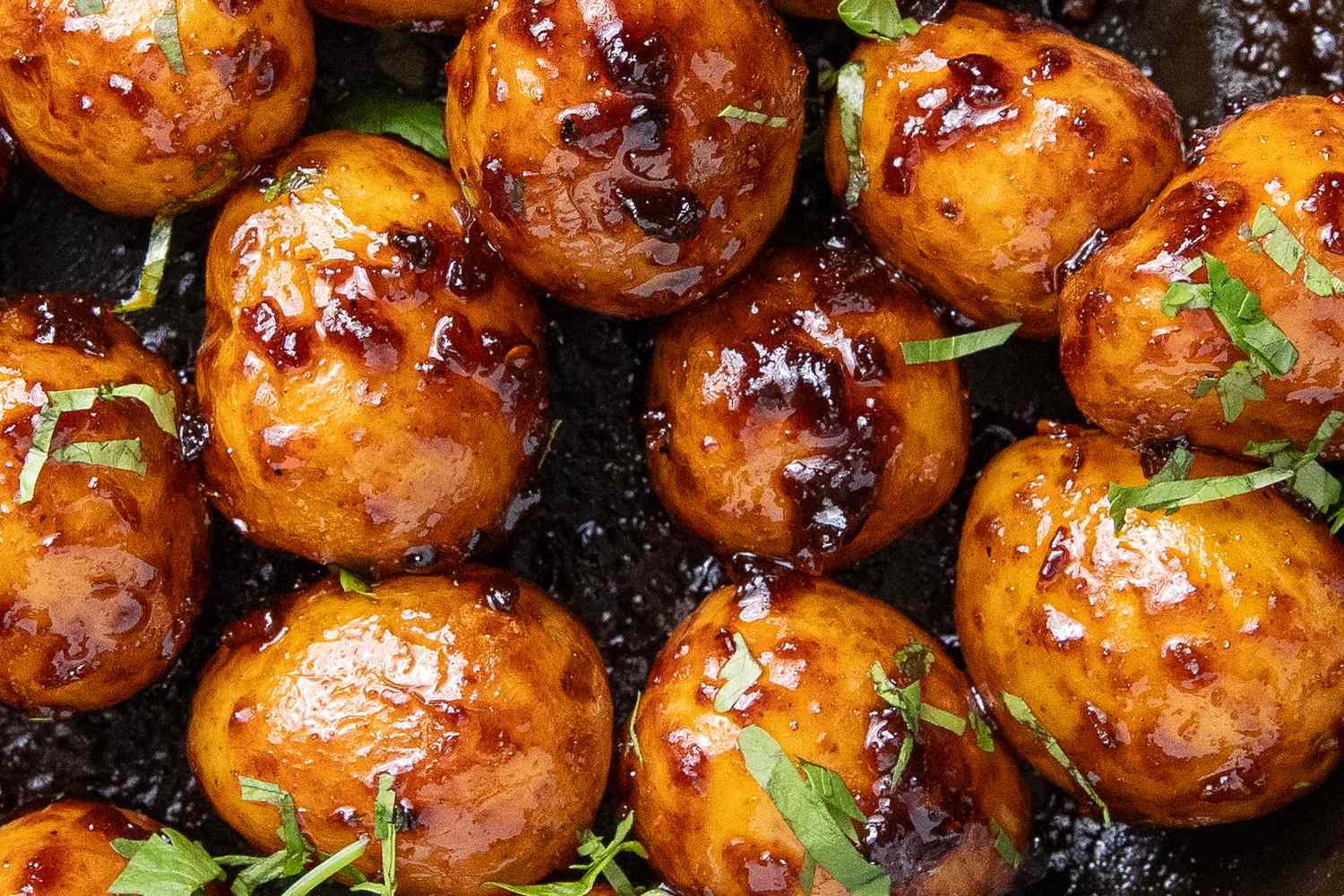 Southwestern sticky potatoes garnished with chopped herbs
