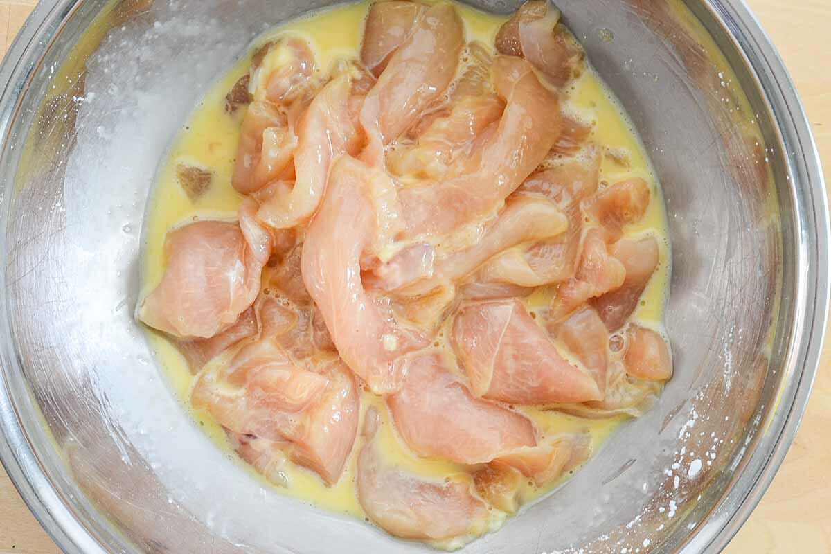 Easy Moo Goo Gai Pan Recipe soak the chicken in egg and cornstarch