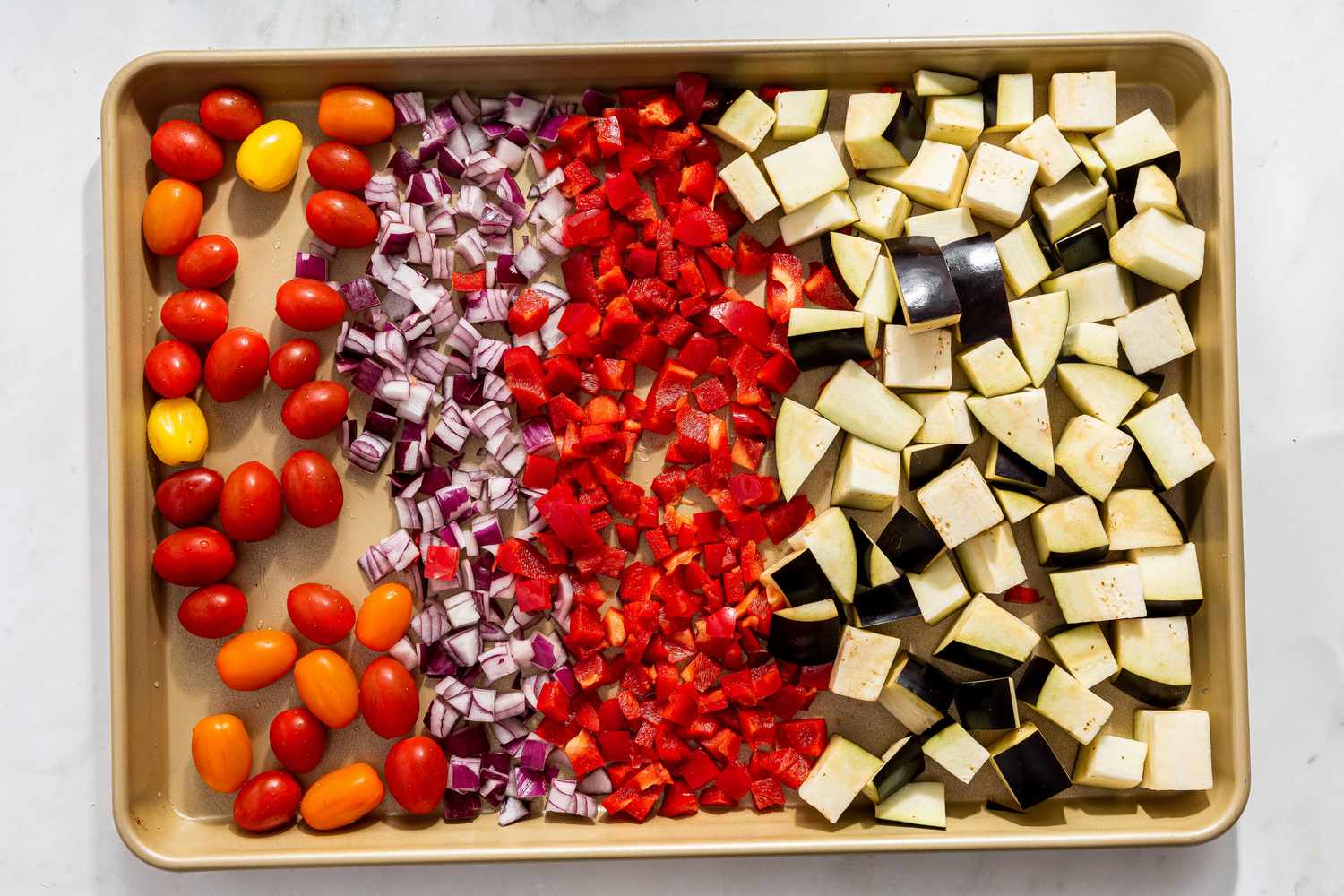 sliced vegetables in a sheet panfor caponata pasta recipe