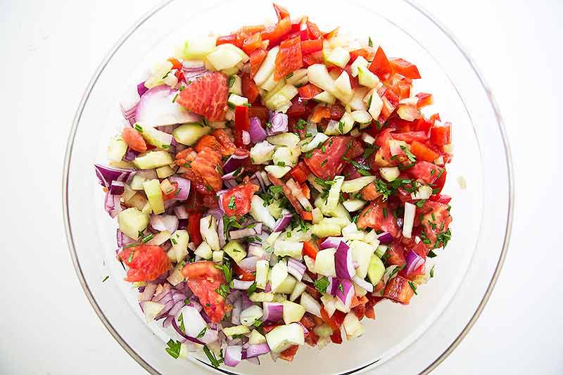 Vegetables chopped for gazpacho in a bowl