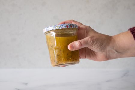 Vigorously shake jar of Italian dressing.