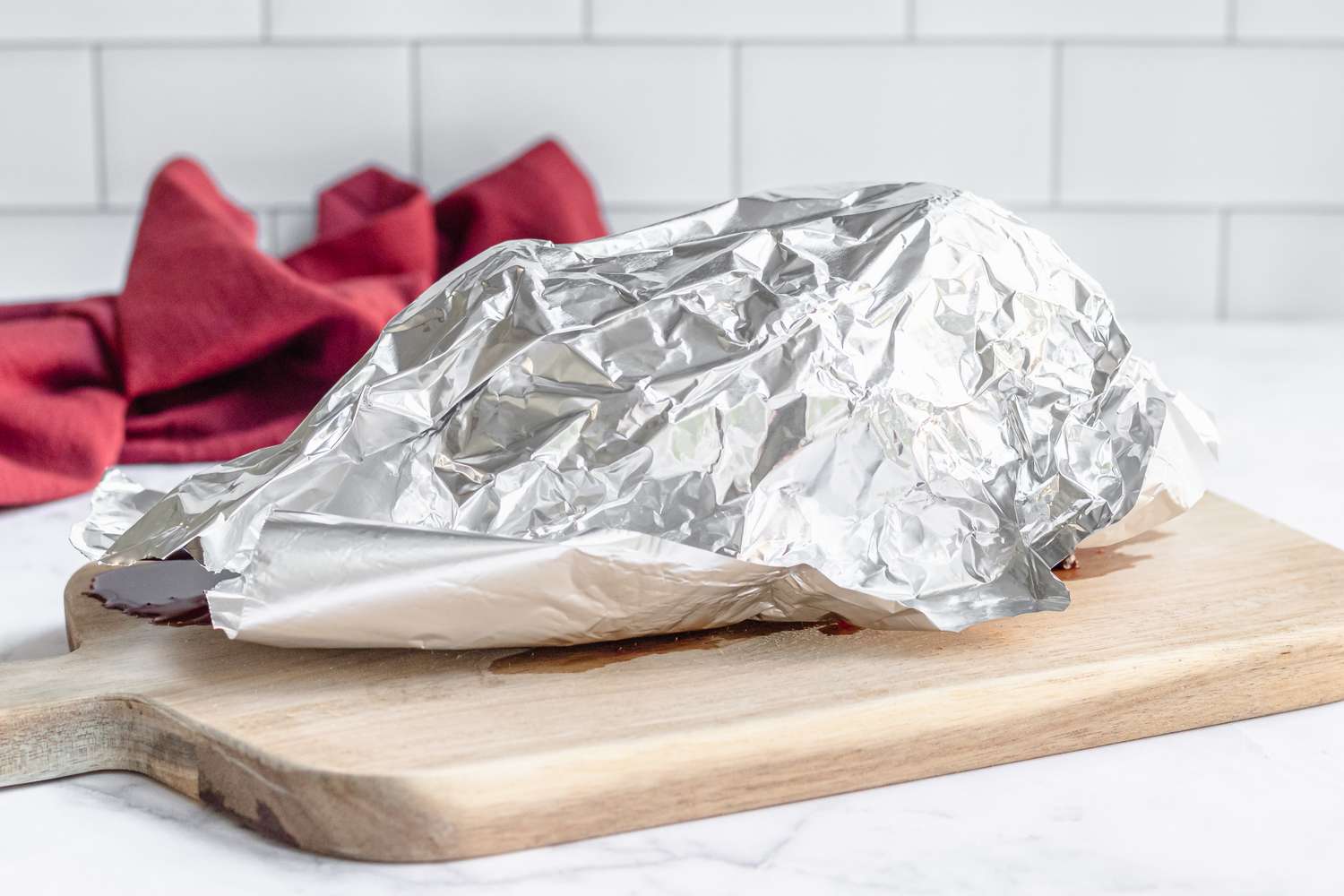 Foil wrapped roast beef to make a roast beef recipe.