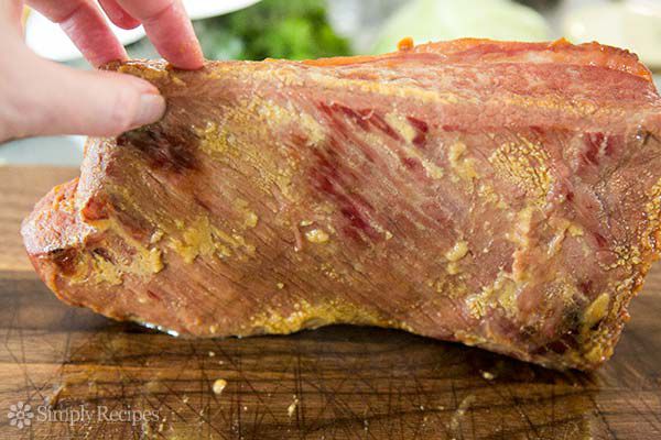 Inspecting grain direction on baked corned beef 