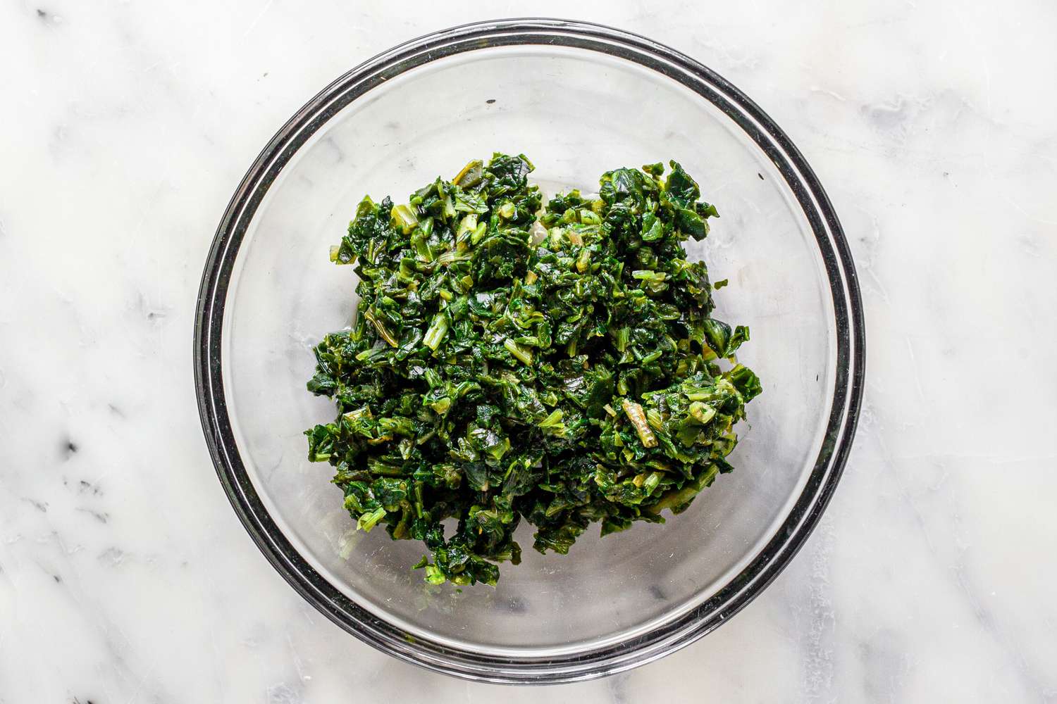 Bowl of Defrosted Spinach for Spinach Dip Recipe