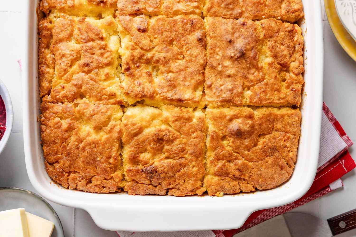 butter swim biscuits in a baking dish 