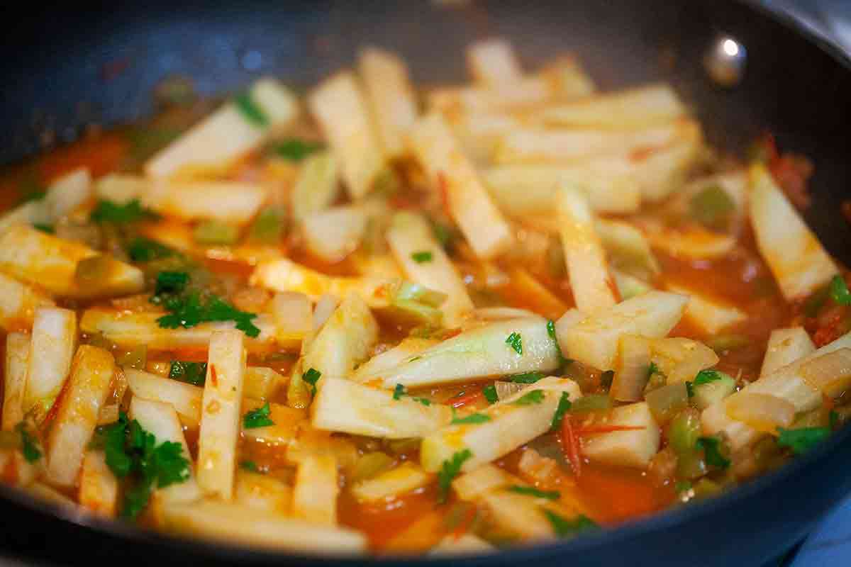saute chayote with tomatoes and onions