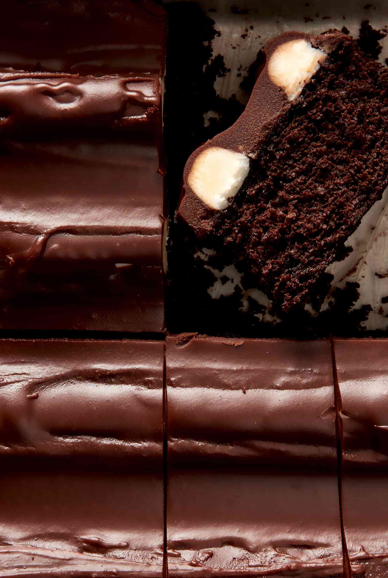 Bumpy cake close-up (cut into individual slices with one slice facing camera to show cross-section cut)