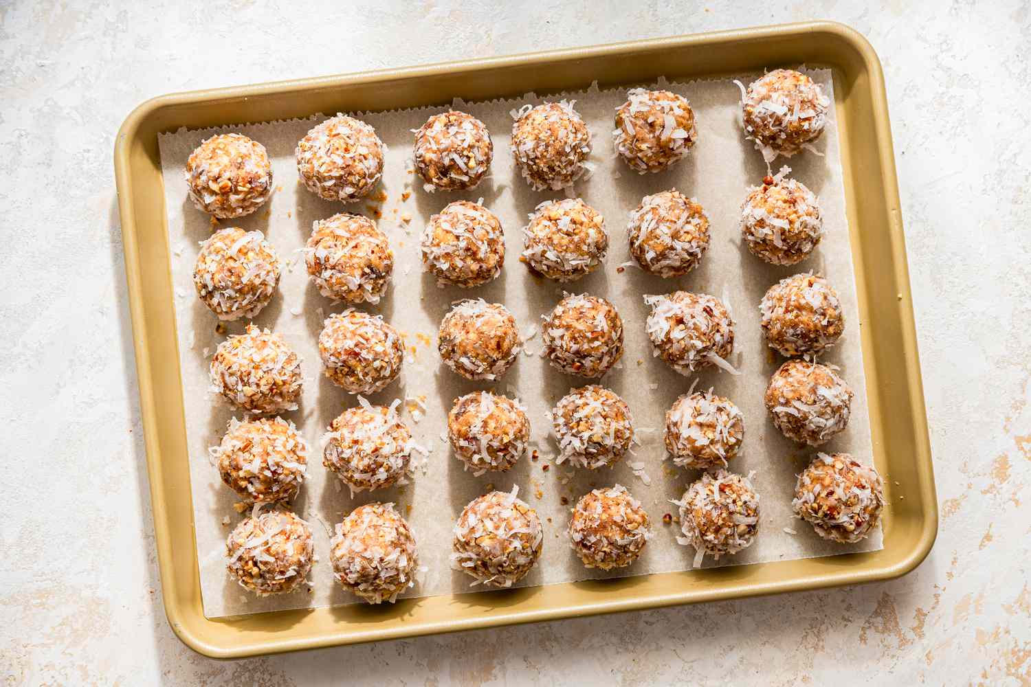 Date skillet cookies on a parchment paper lined baking sheet 