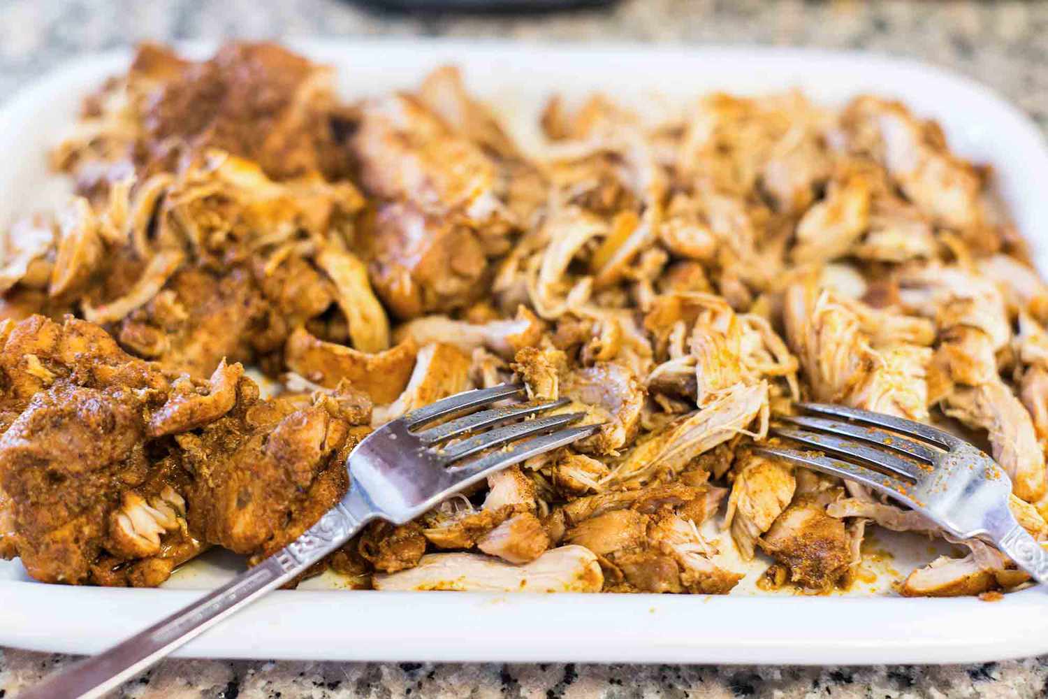 Pressure Cooker Shredded Chicken shred the chicken with forks
