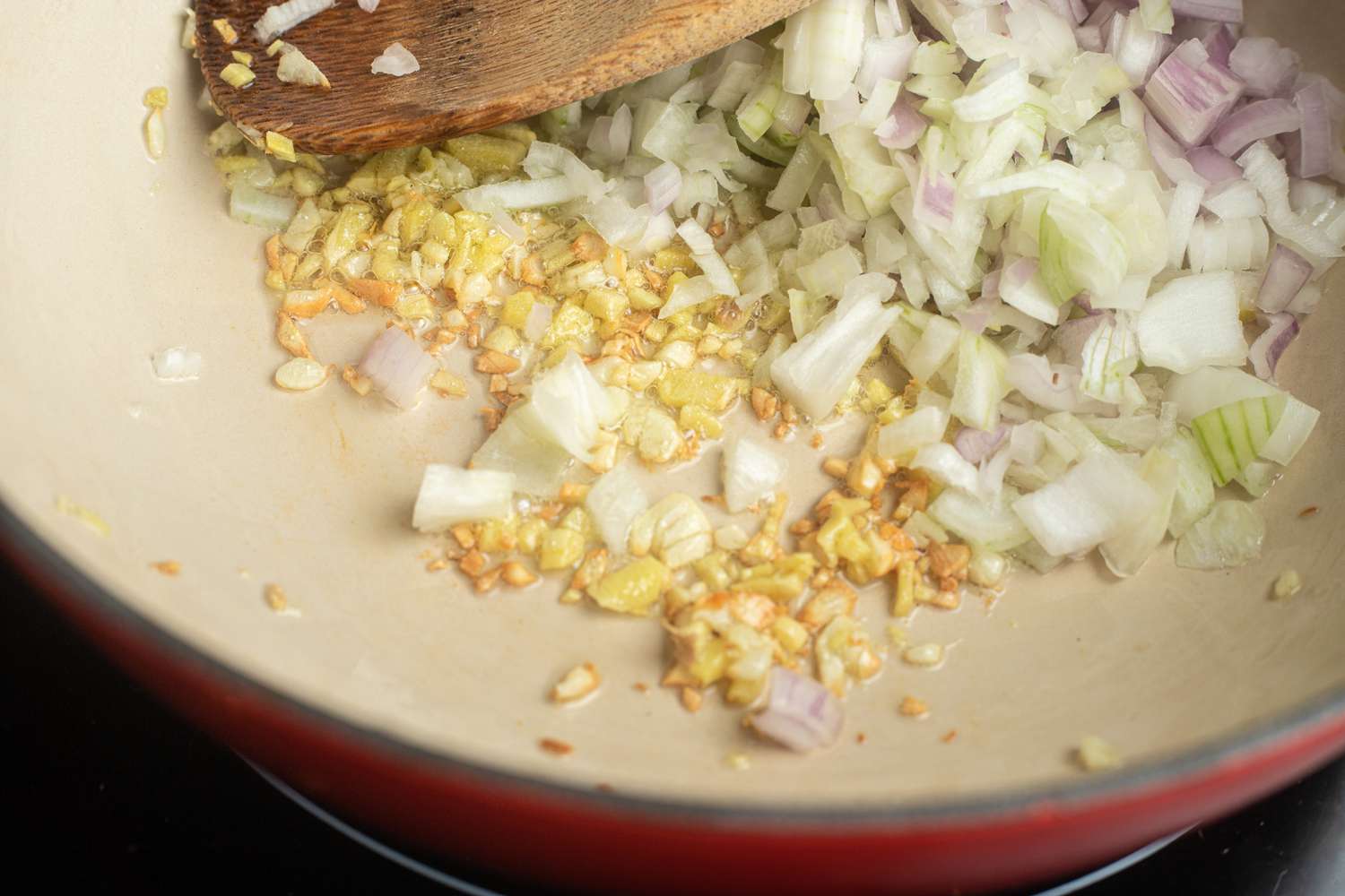 Sauté the aromatics for matar paneer