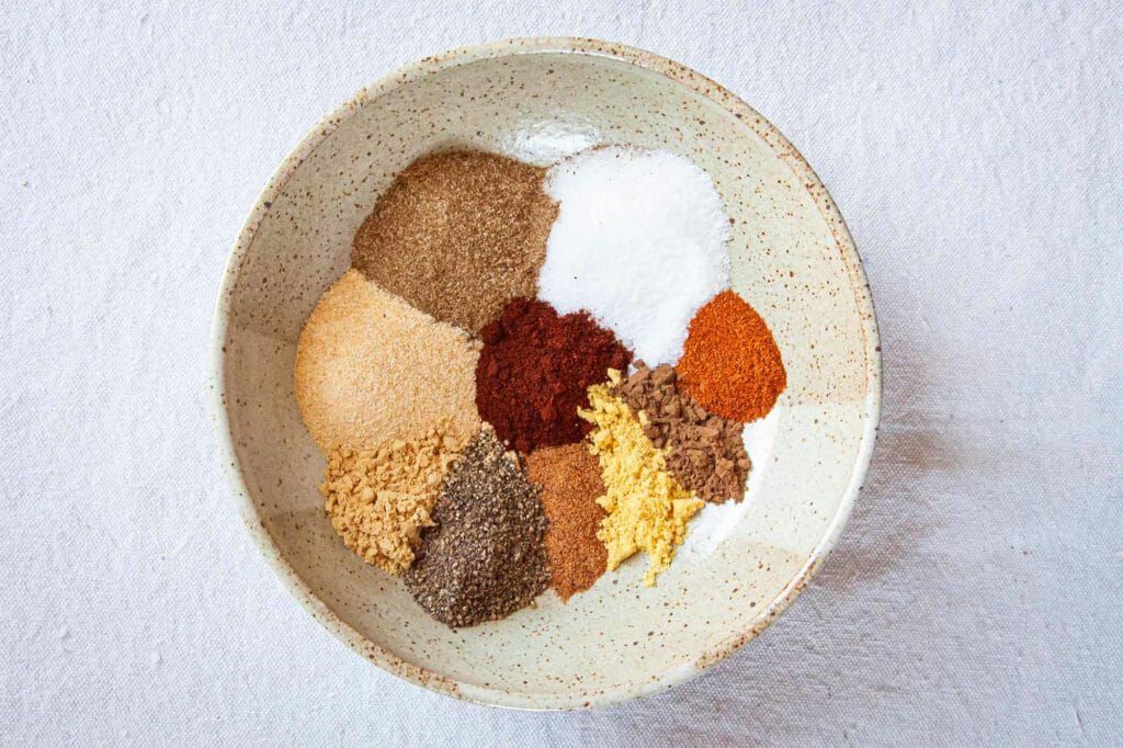 Dry rub for fish - colorful spices in bowl