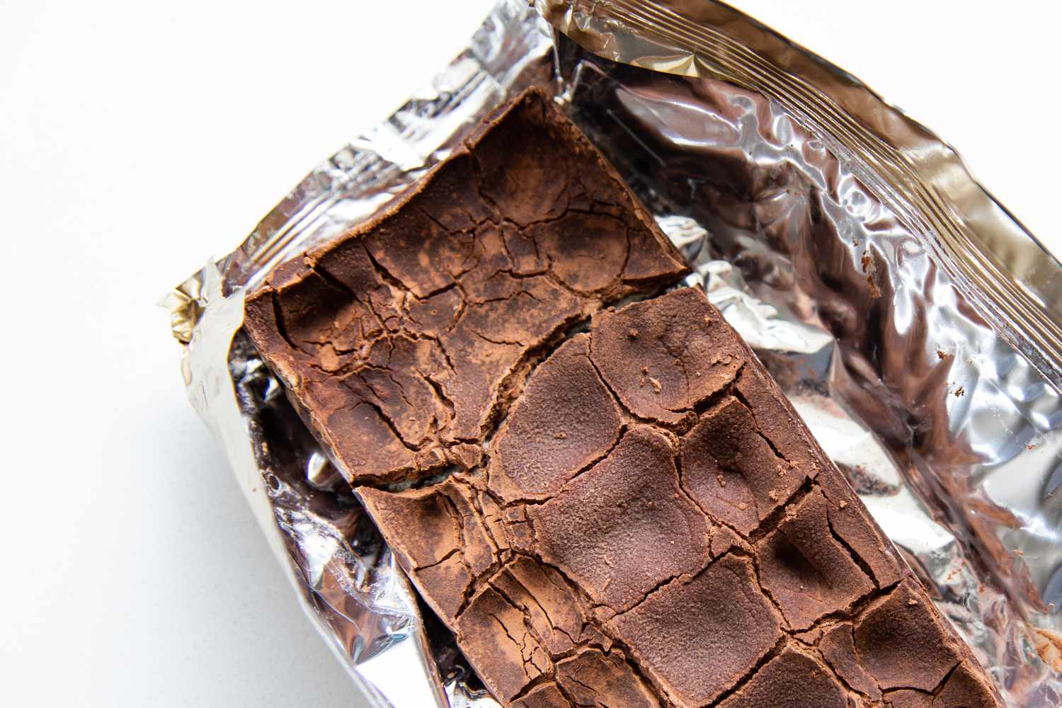 A chocolate bar showing white bloom and crackling