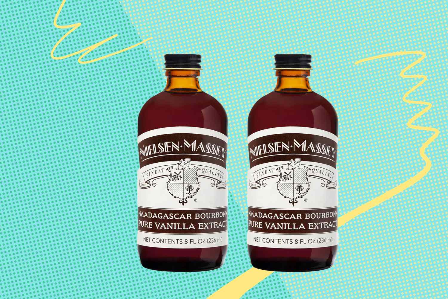 Two bottles of NielsenMassey Madagascar Bourbon pure vanilla extract displayed side by side with a colorful background