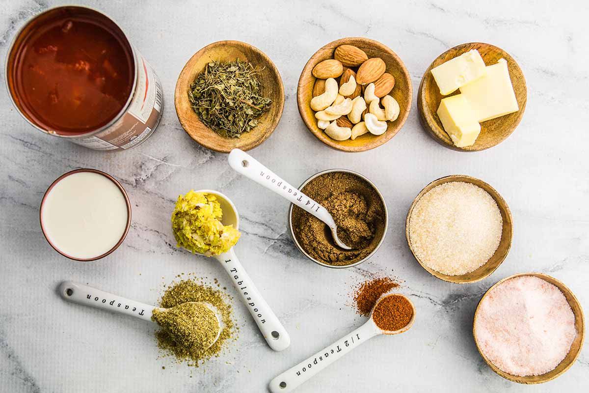 Spices and ingredients laid out for making Butter Chicken
