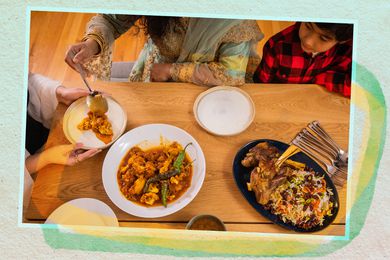 People sitting around a table for Eid