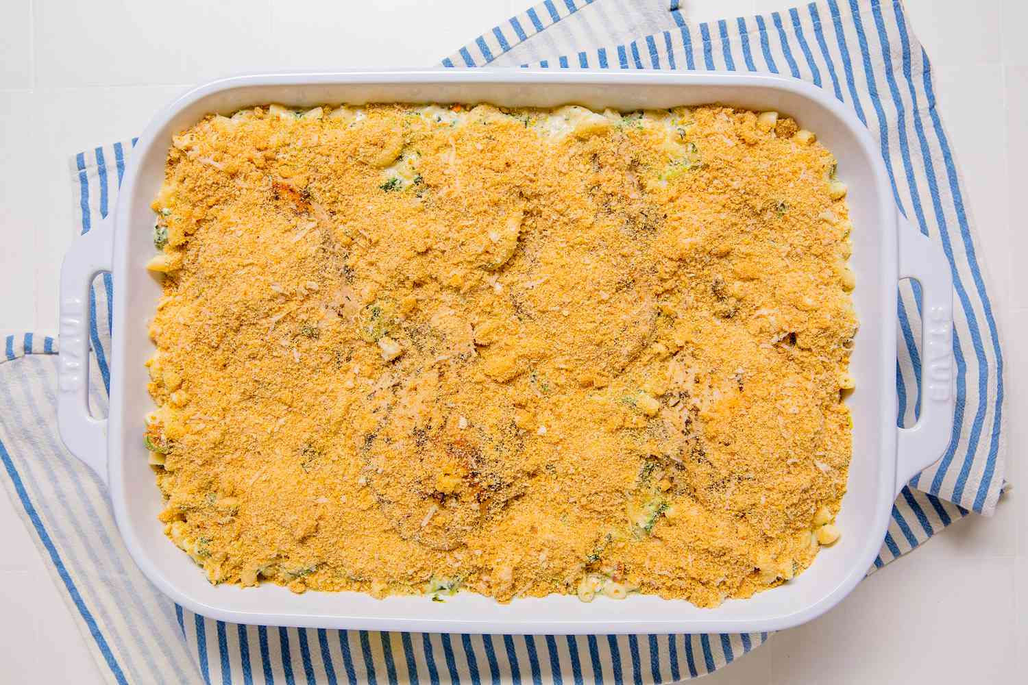 Overhead view of breadcrumbs added to the casserole dish for Marry Me Chicken Casserole recipe