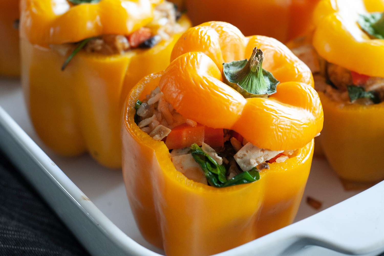 Vegetarian Stuffed Peppers in casserole dish