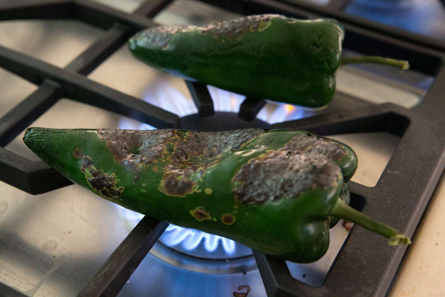 Poblano Peppers on Roasting on Stove for Chile en Nogada