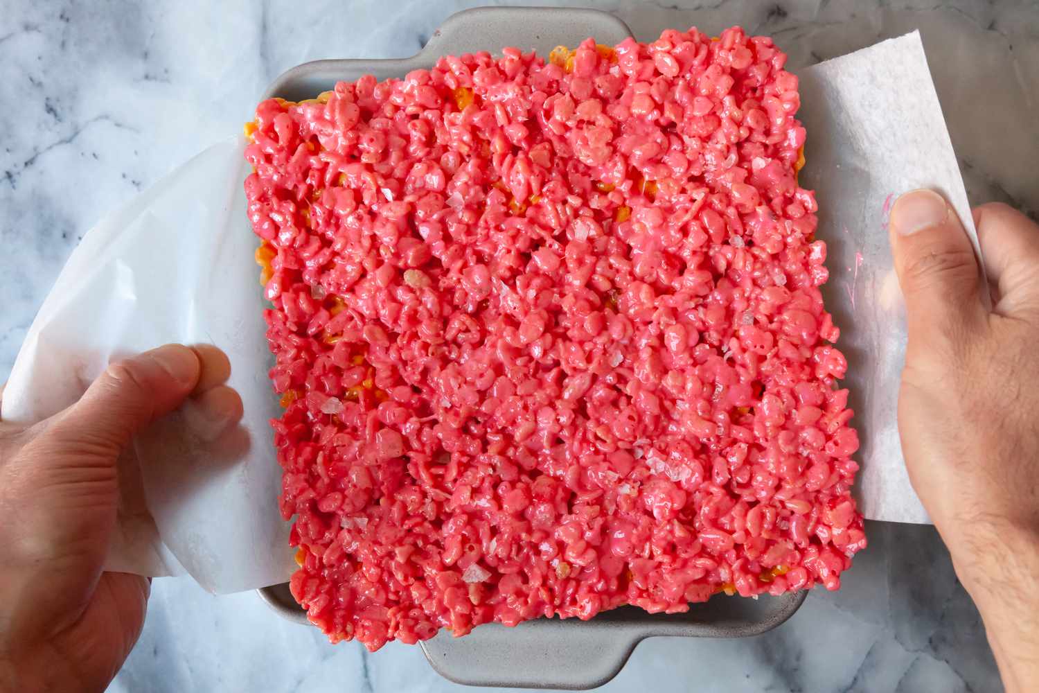 Lift Rainbow Rice Krispies Treats from Pan Using Parchment Paper