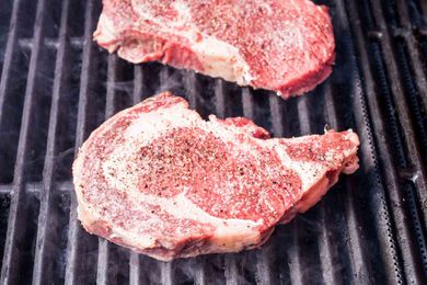 How to Grill Ribeye steak add the steak to the grill