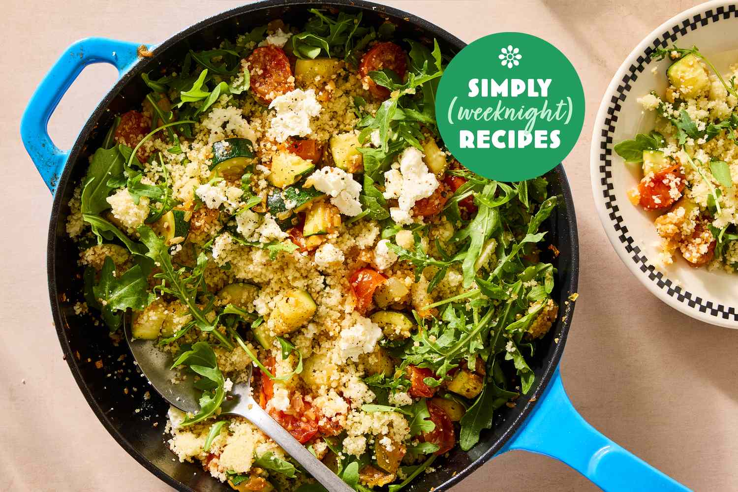 A skillet of a vegetable and quinoa dish labeled Simply Weeknight Recipes with a plated portion nearby